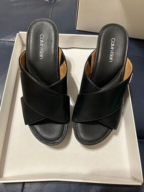 Calvin Klein Black Crisscross Mule Slides